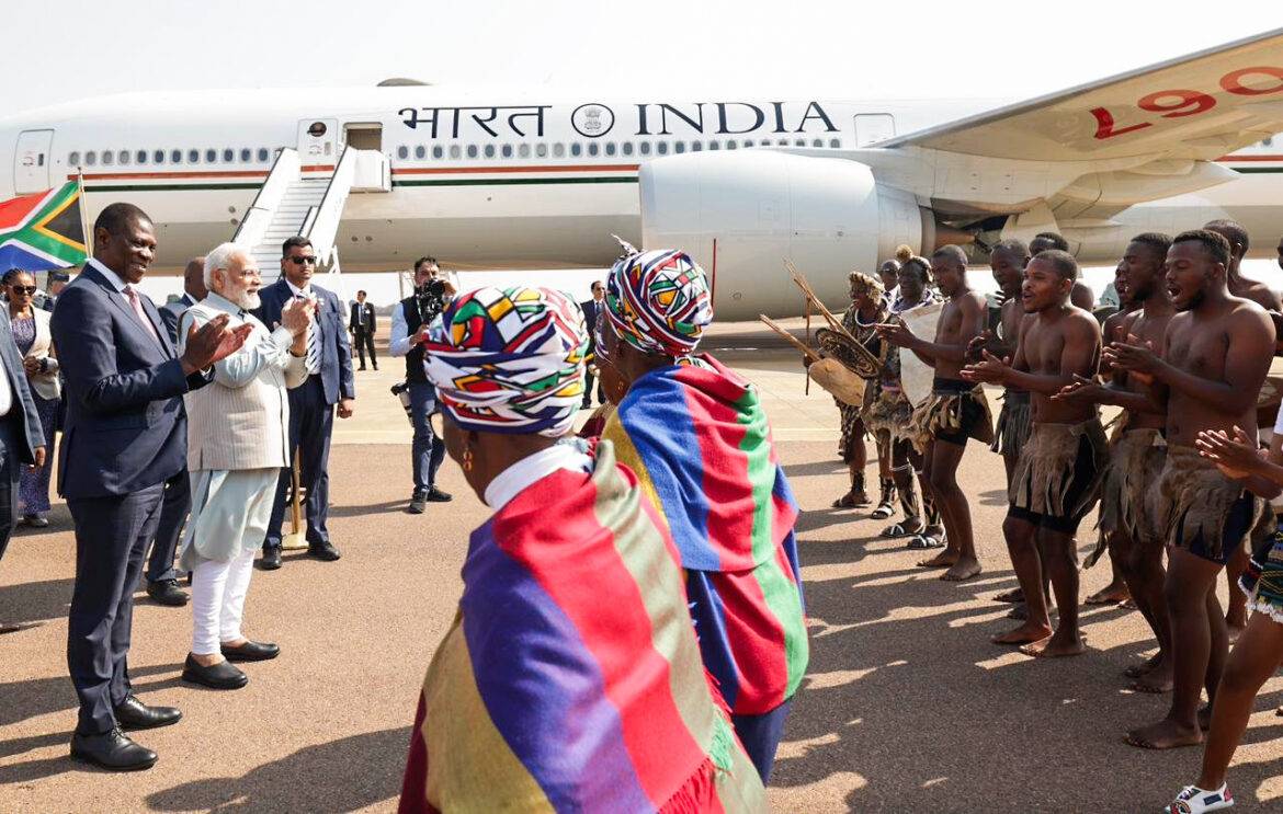 Prime Minister Narendra Modi being welcomed traditionally on his arrival in Johannesburg
