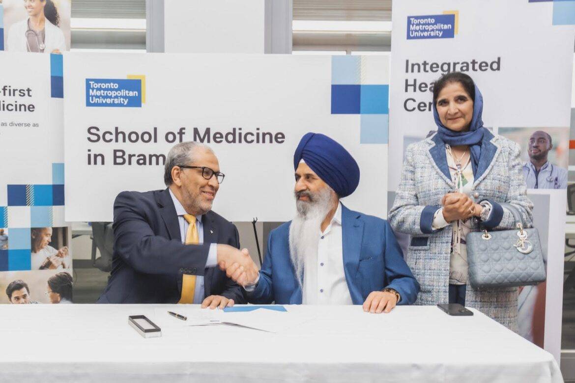 ML_BD Mohamed Lachemi and Bikram Dhillon shaking hands, with Mrs. Varinder Dhillon looking on.